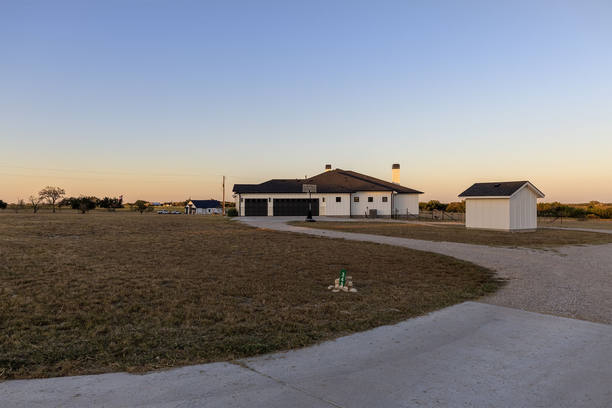 345 Judge's Road Burnet, TX 78611 - Photo 3 of 40 a front view of a house with a yard