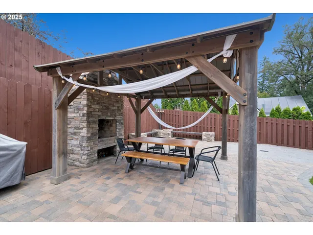 a view of outdoor space with wooden floor and outdoor seating