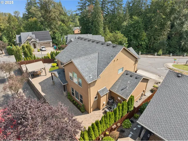 an aerial view of a house with a garden