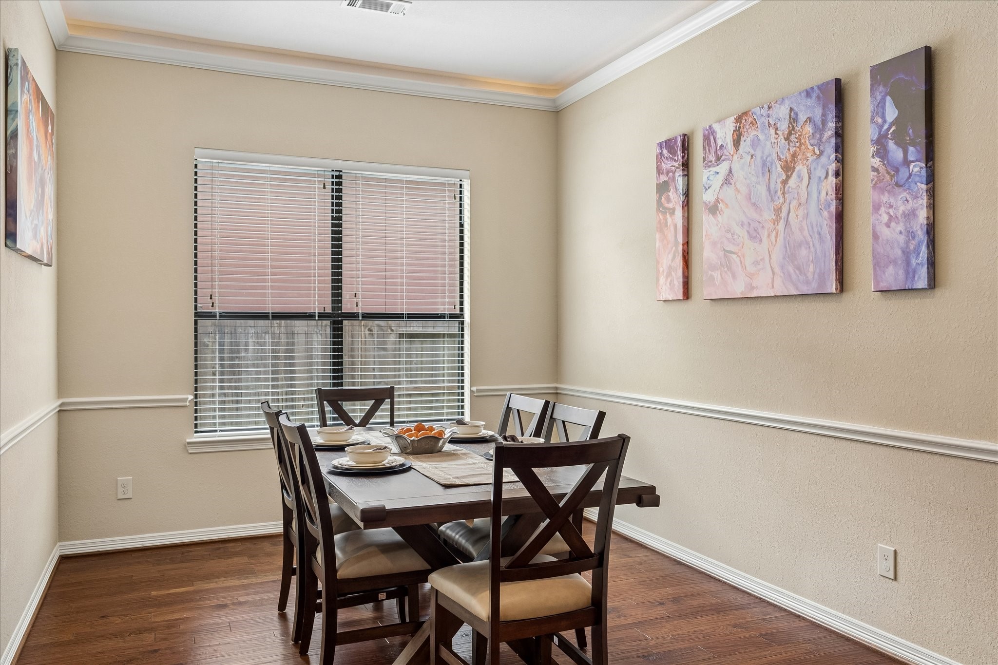 622 West Fork Webster, TX 77598 - Photo 12 of 36 A separate dining room adds flexibility for gatherings, celebrations, or everyday meals. Uplighting above crown molding takes it a notch above