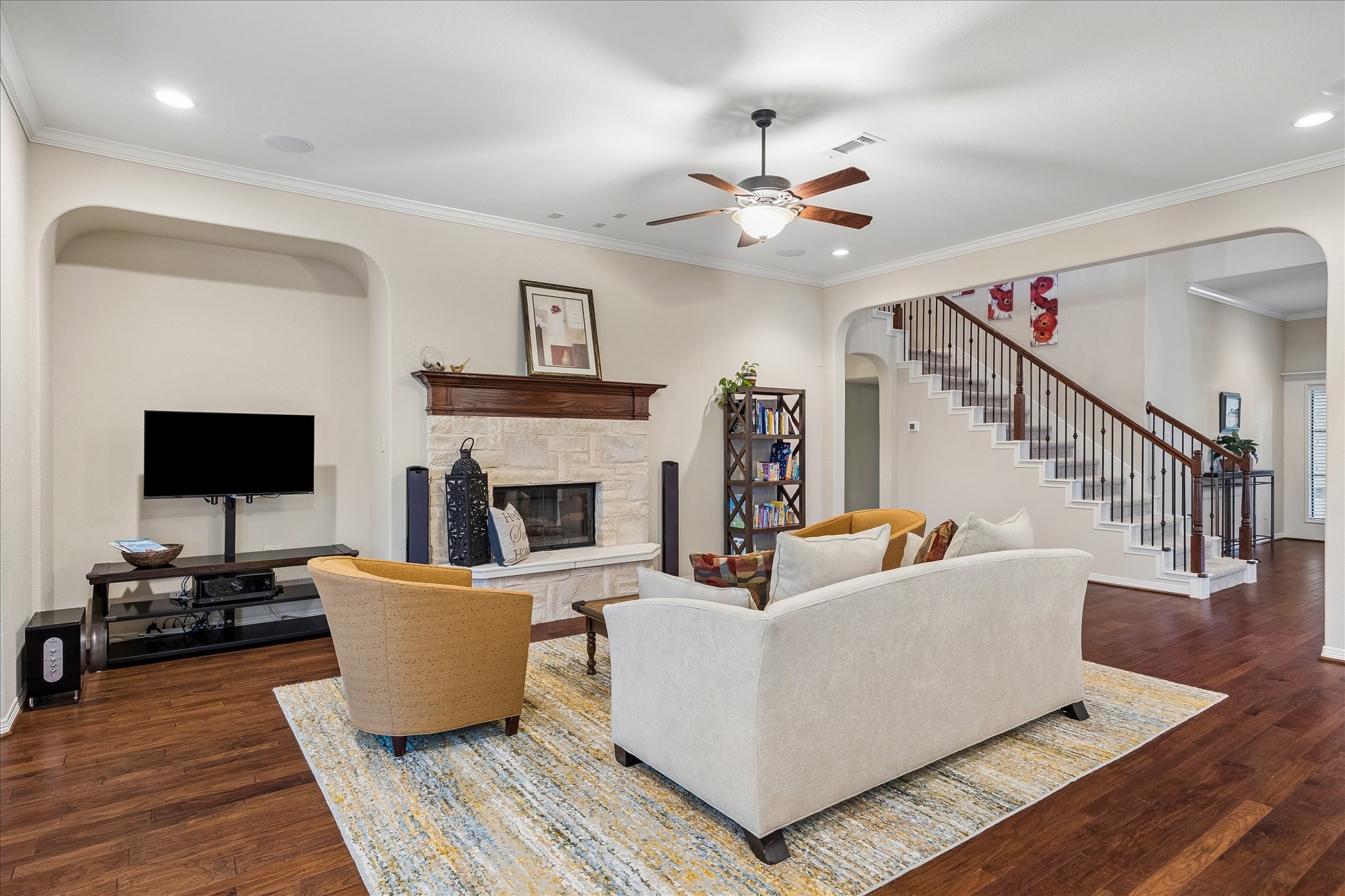 622 West Fork Webster, TX 77598 - Photo 23 of 36 Another view before you head to the private area for the 2ndry bedrooms showcasing the wood flooring, high ceiling, arched room dividers, crown molding, recessed lights - we could go on and on!