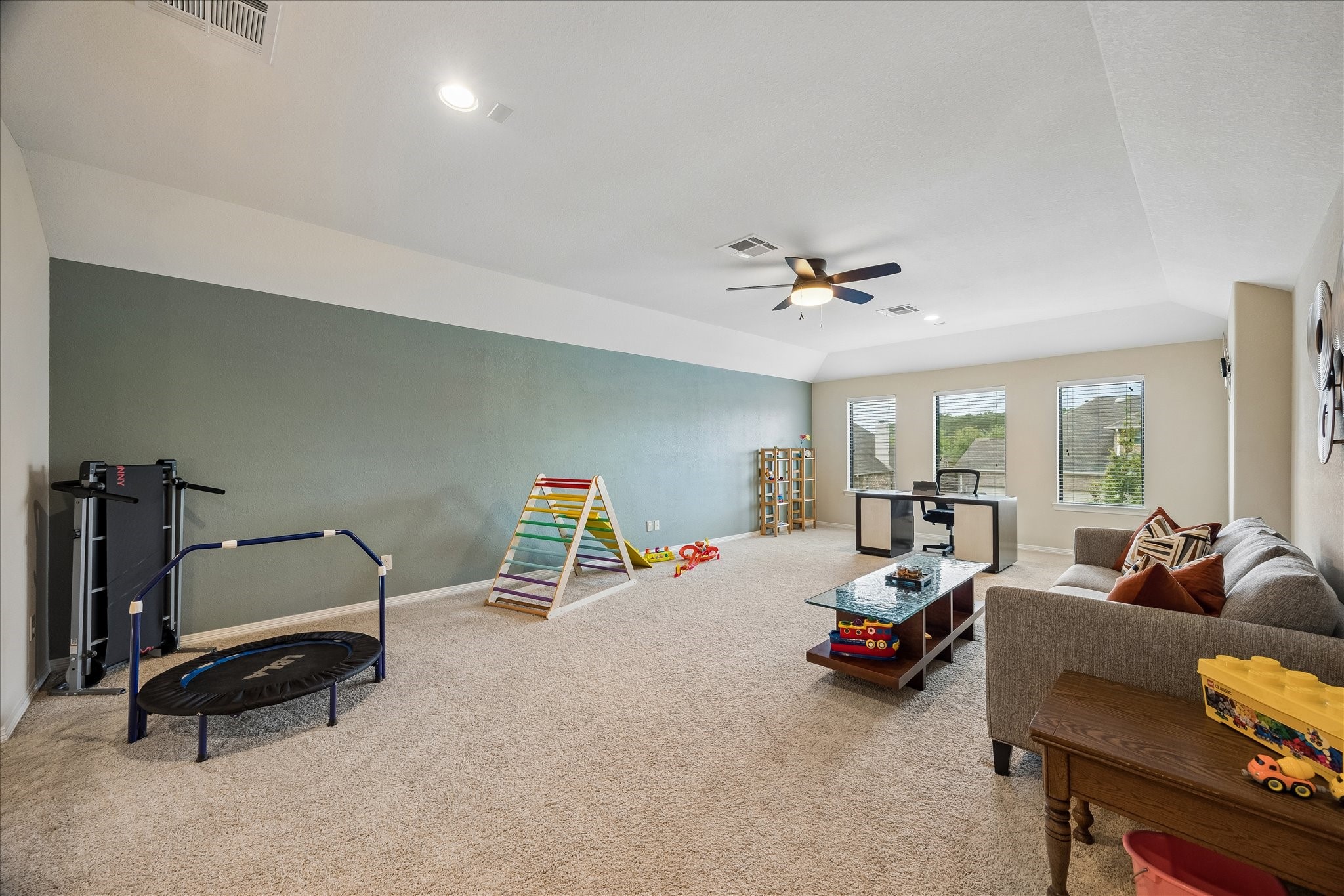 622 West Fork Webster, TX 77598 - Photo 24 of 36 Large upstairs game room or media space—ideal for entertaining, hobbies, or additional living area. With a full bath upstairs, this flexible area can support a variety of uses. And who doesn't want more space?
