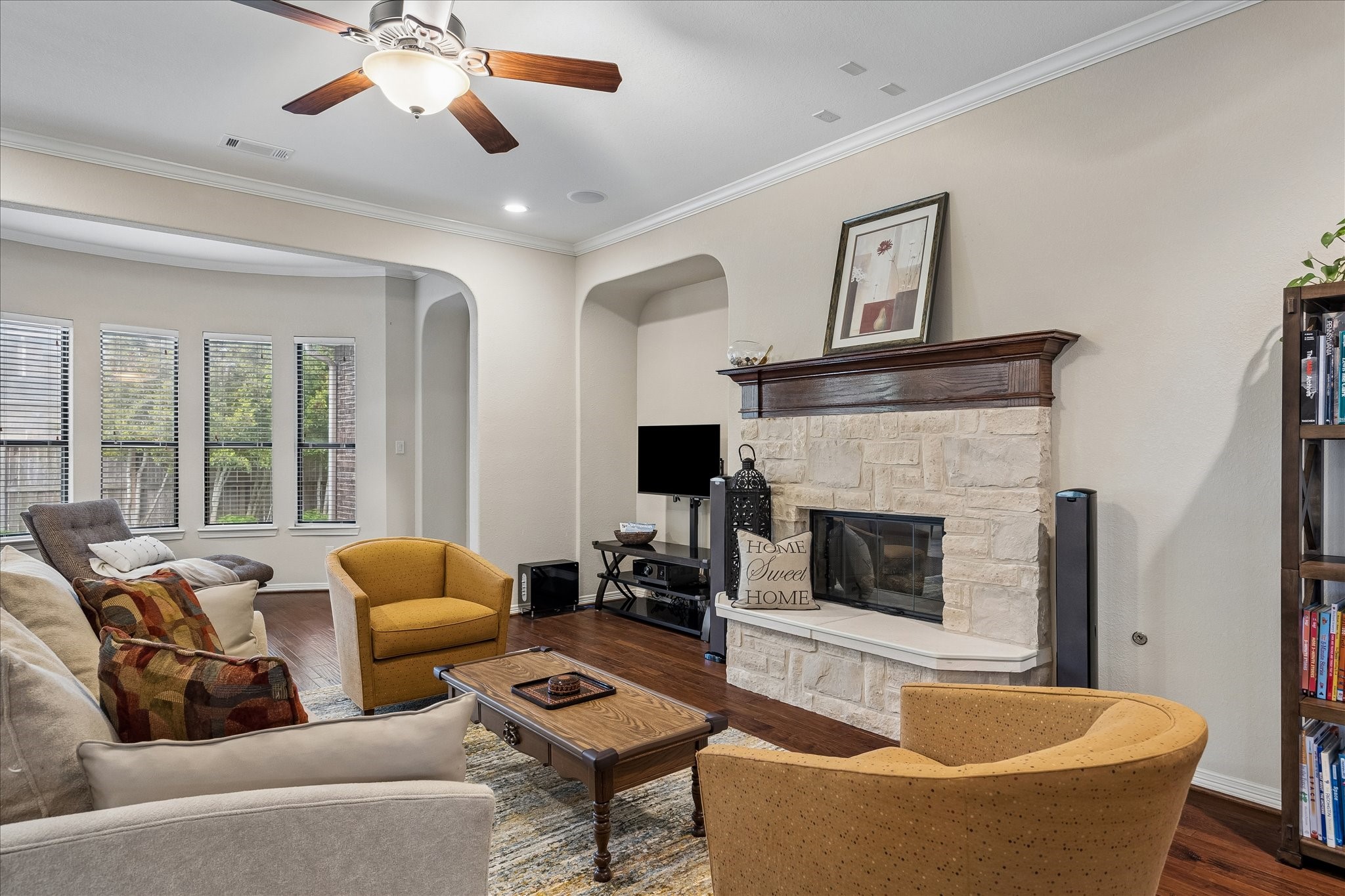 622 West Fork Webster, TX 77598 - Photo 3 of 36 The main living area centers around a fireplace and offers generous space to gather and unwind. Crown molding throughout as well as well placed recessed lighting