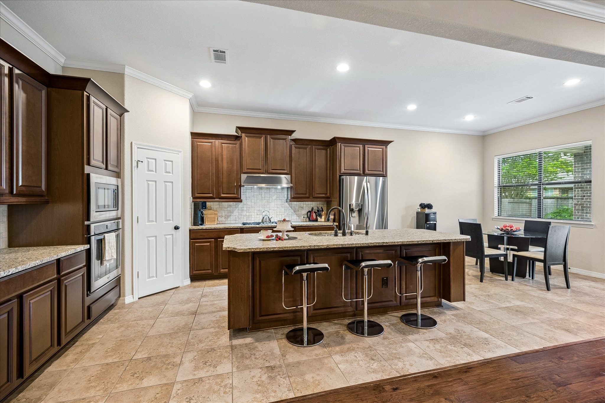622 West Fork Webster, TX 77598 - Photo 8 of 36 The kitchen features a large island, pantry, abundant cabinetry, and space that works well for both daily routines and entertaining.