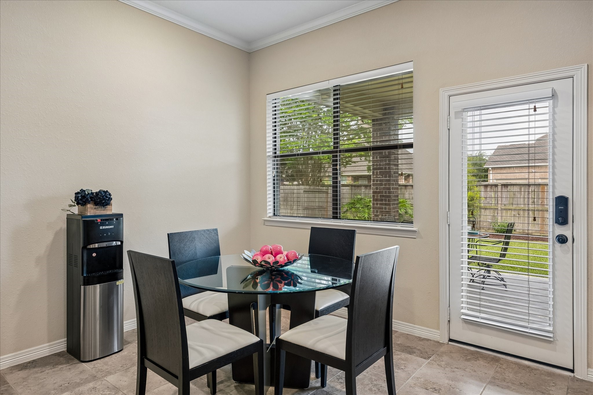 622 West Fork Webster, TX 77598 - Photo 9 of 36 Breakfast area offers natural light with backyard views and direct access to covered patio for indoor-outdoor living.