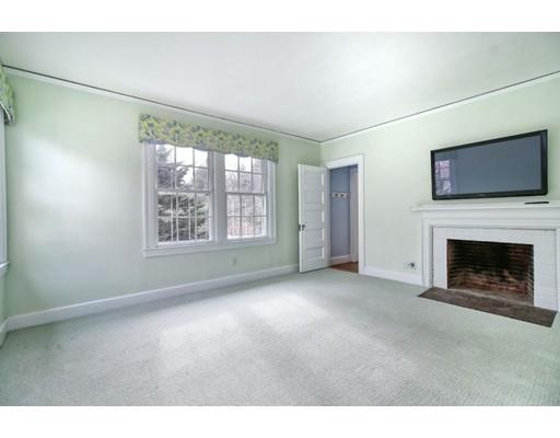 54 Pheasant Landing Road Needham, MA 02492 - Photo 19 of 30 a view of an empty room with a window and fireplace