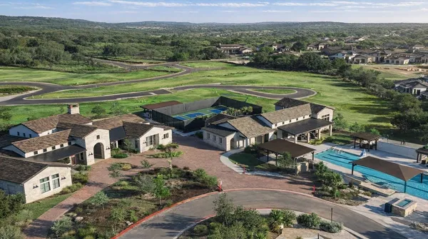 an aerial view of a house with outdoor space