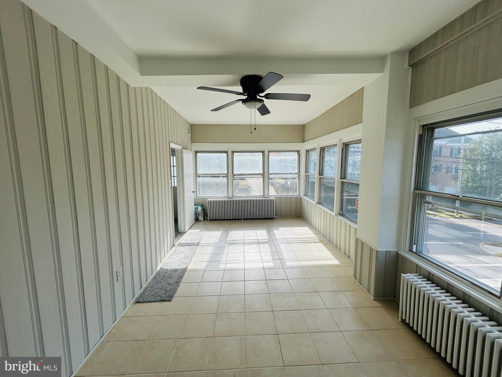 326 Fountain Street Philadelphia, PA 19128 - Photo 13 of 24 a view of entryway and hall with a window