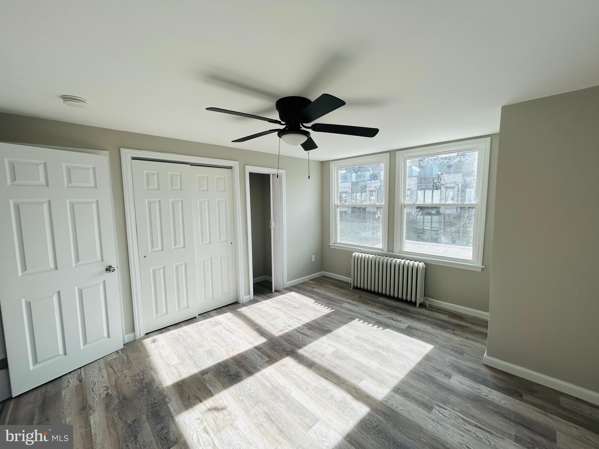 326 Fountain Street Philadelphia, PA 19128 - Photo 16 of 24 a bedroom with a bed and a window