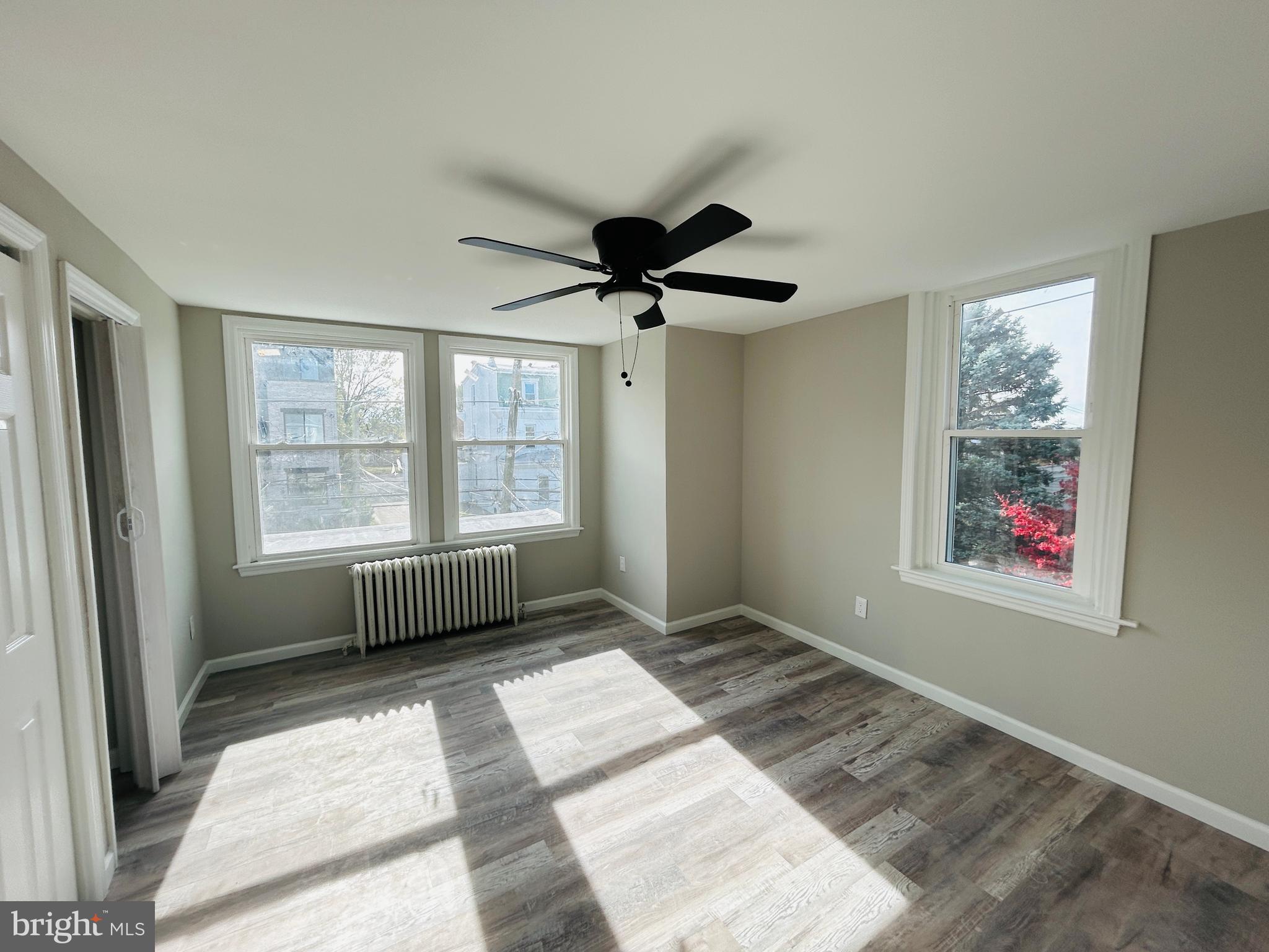 326 Fountain Street Philadelphia, PA 19128 - Photo 17 of 24 a view of an empty room with a window