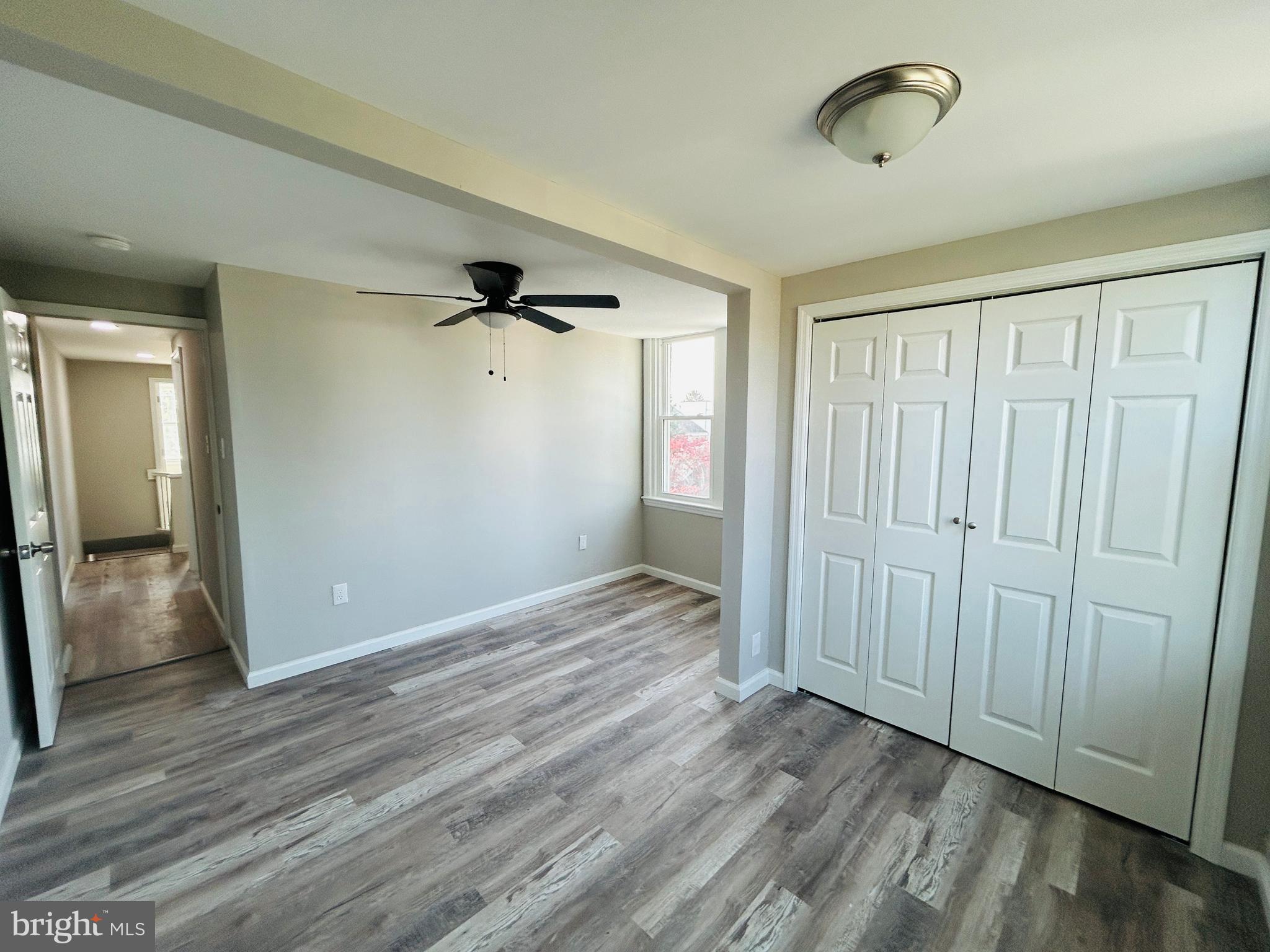 326 Fountain Street Philadelphia, PA 19128 - Photo 22 of 24 a view of an empty room with wooden floor