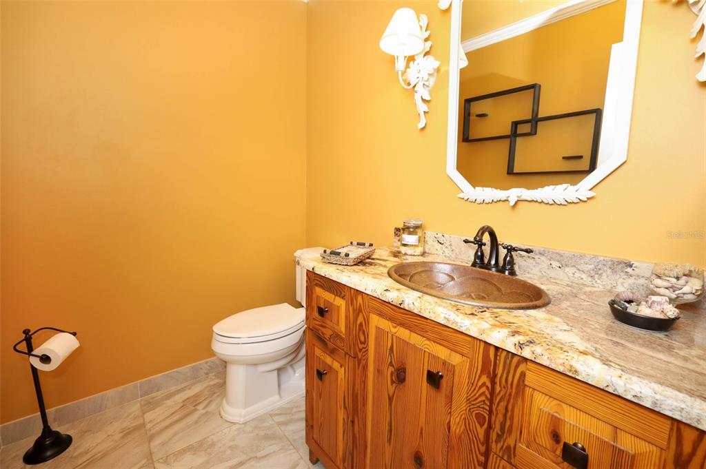 102 Pineview Court Altamonte Springs, FL 32714 - Photo 19 of 59 a bathroom with a granite countertop sink and a mirror