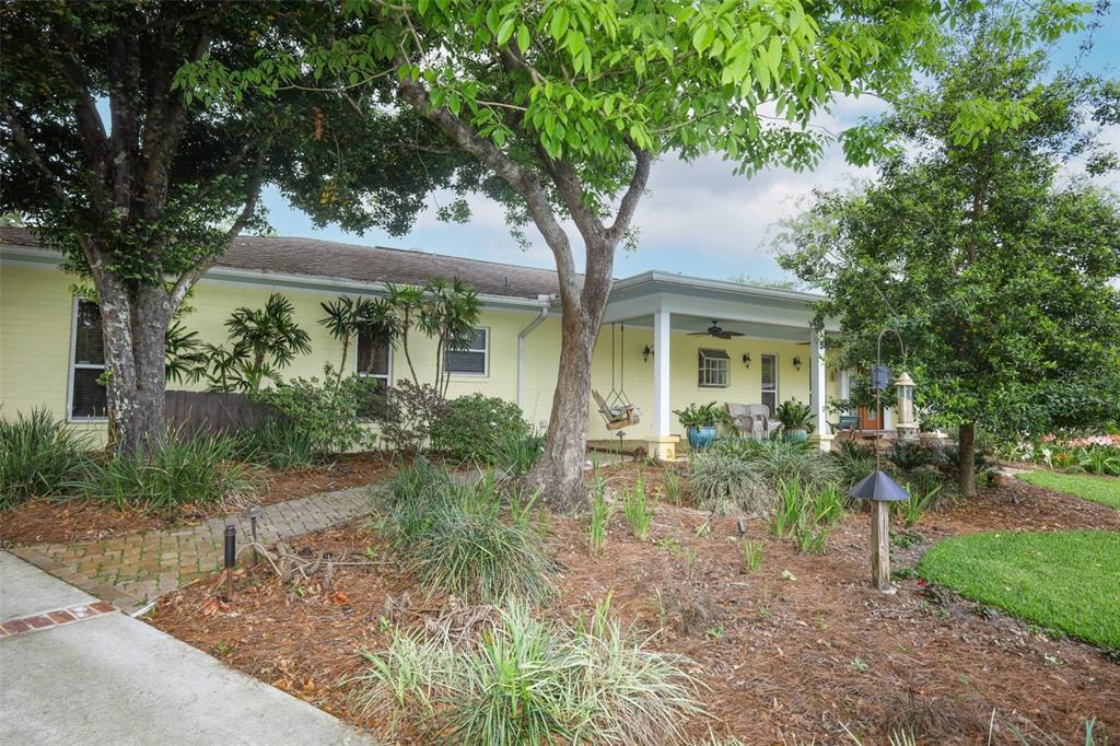 102 Pineview Court Altamonte Springs, FL 32714 - Photo 2 of 59 a front view of a house with garden