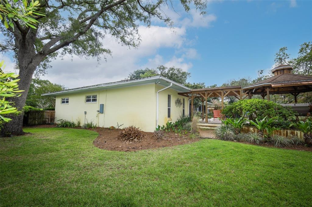 102 Pineview Court Altamonte Springs, FL 32714 - Photo 48 of 59 a front view of house with a garden