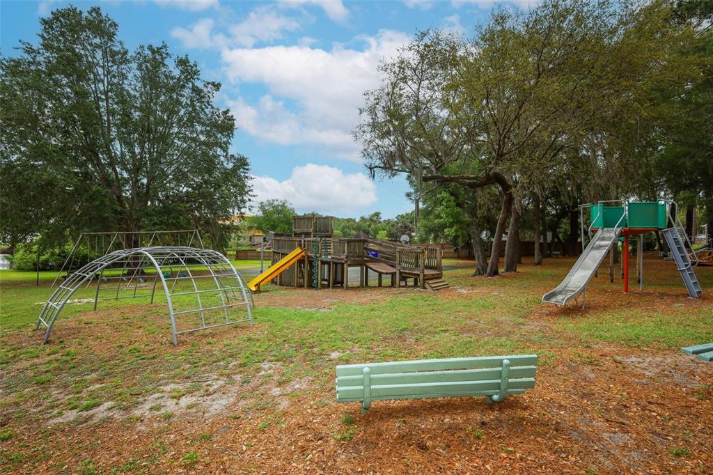 102 Pineview Court Altamonte Springs, FL 32714 - Photo 53 of 59 a view of a park with swings