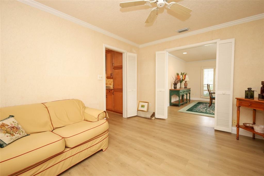 102 Pineview Court Altamonte Springs, FL 32714 - Photo 9 of 59 a living room with furniture and a wooden floor