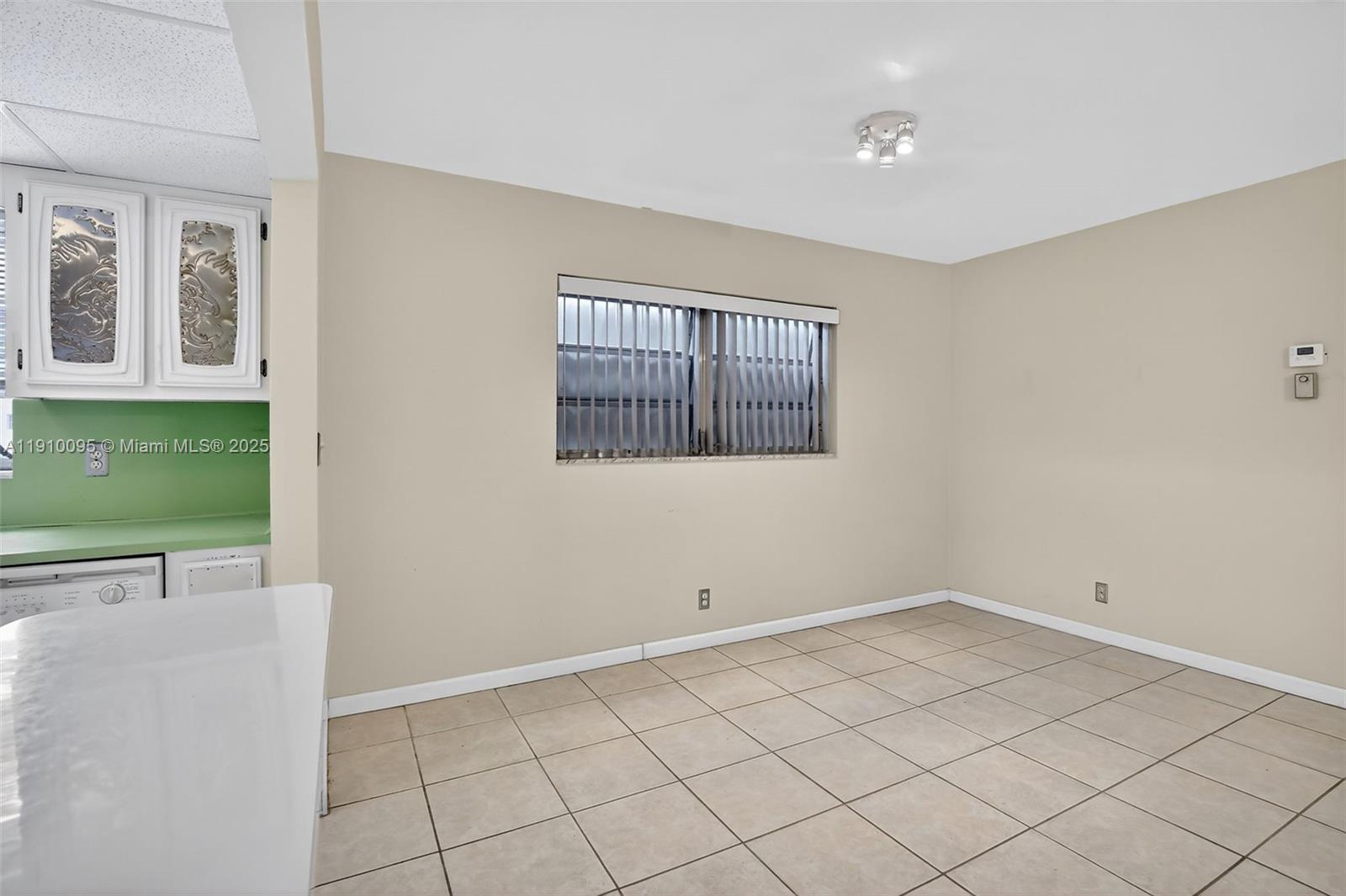 5300 Washington Street, Unit T218 Hollywood, FL 33021 - Photo 13 of 36 a view of a livingroom with a window and entertaining space