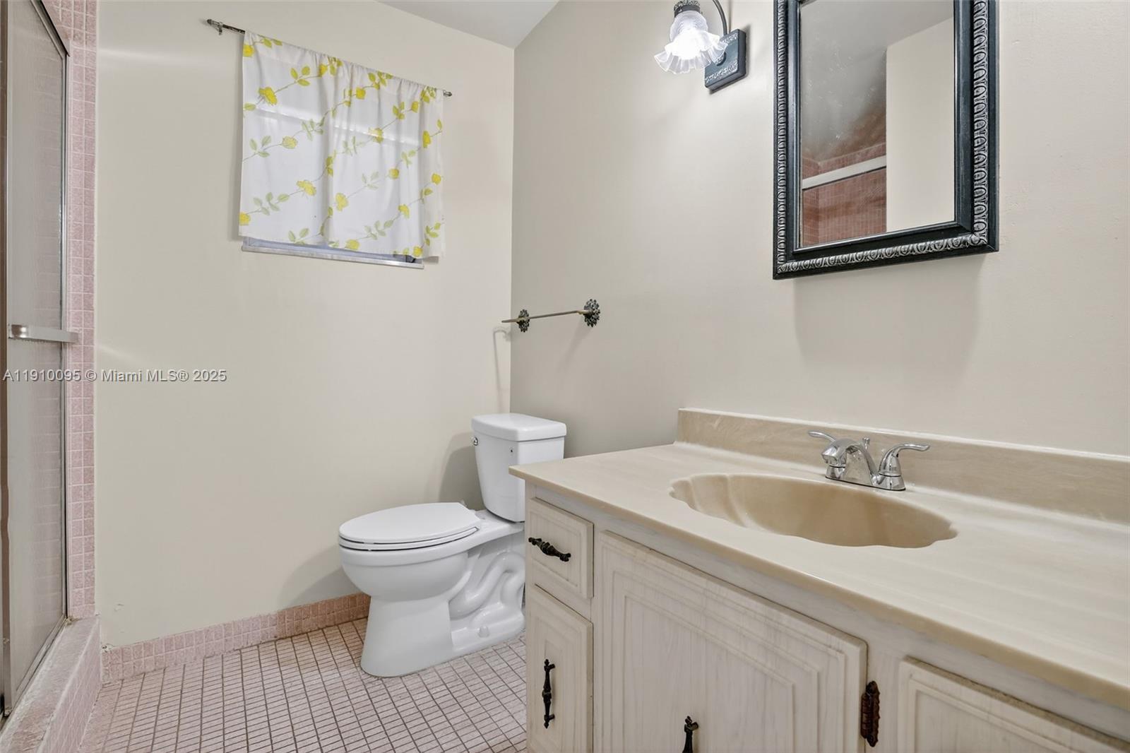 5300 Washington Street, Unit T218 Hollywood, FL 33021 - Photo 16 of 36 a bathroom with a sink and a toilet