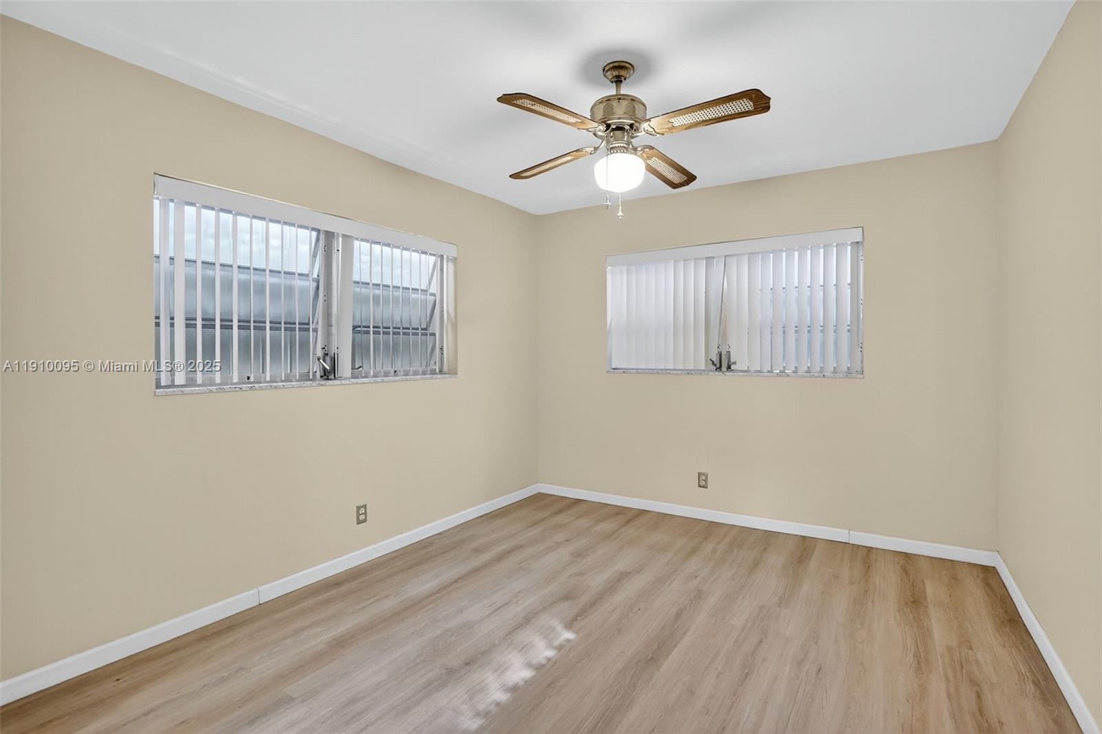 5300 Washington Street, Unit T218 Hollywood, FL 33021 - Photo 23 of 36 a view of a room with wooden floor and windows