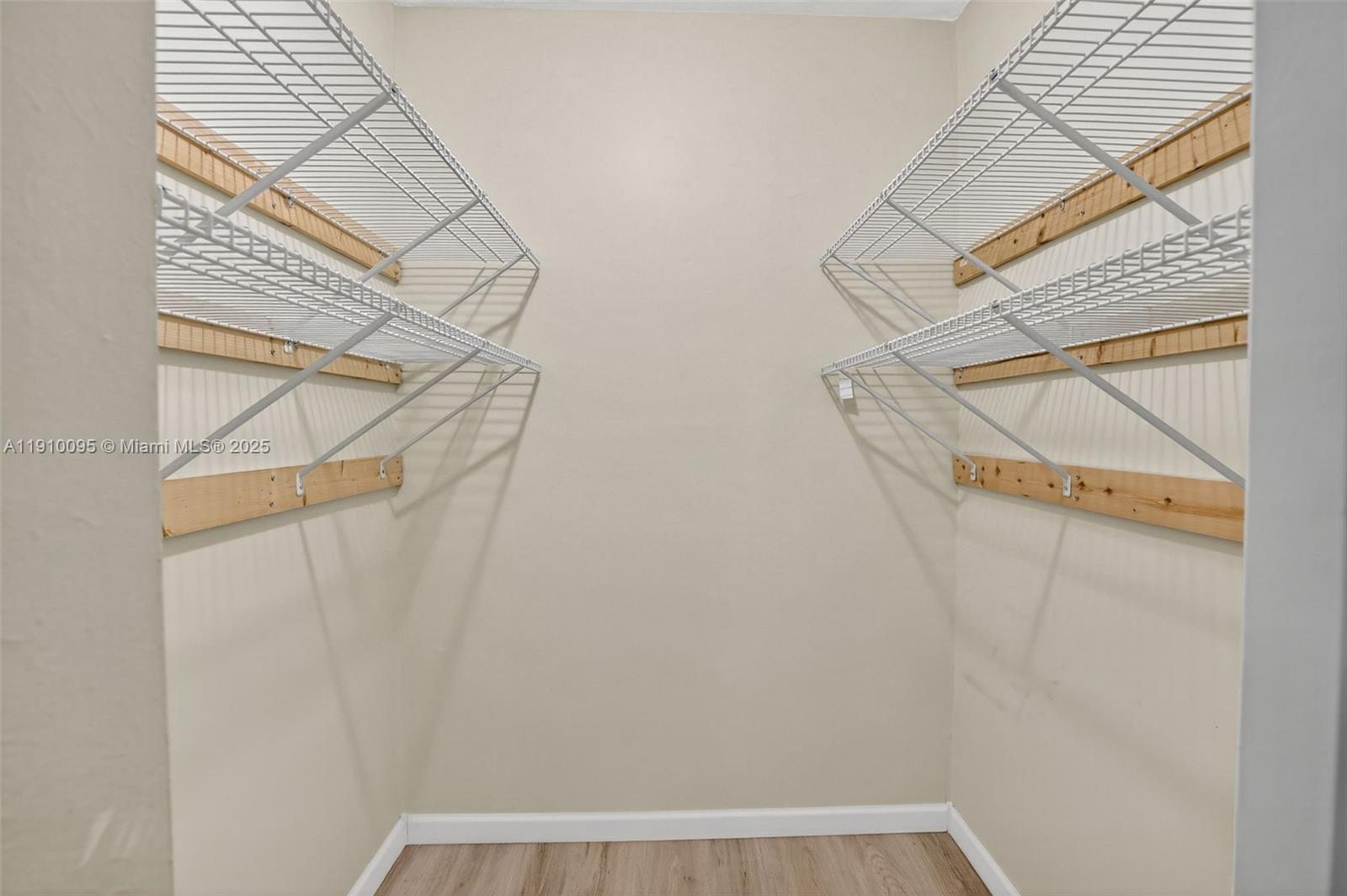 5300 Washington Street, Unit T218 Hollywood, FL 33021 - Photo 27 of 36 a view of walk in closet with empty racks