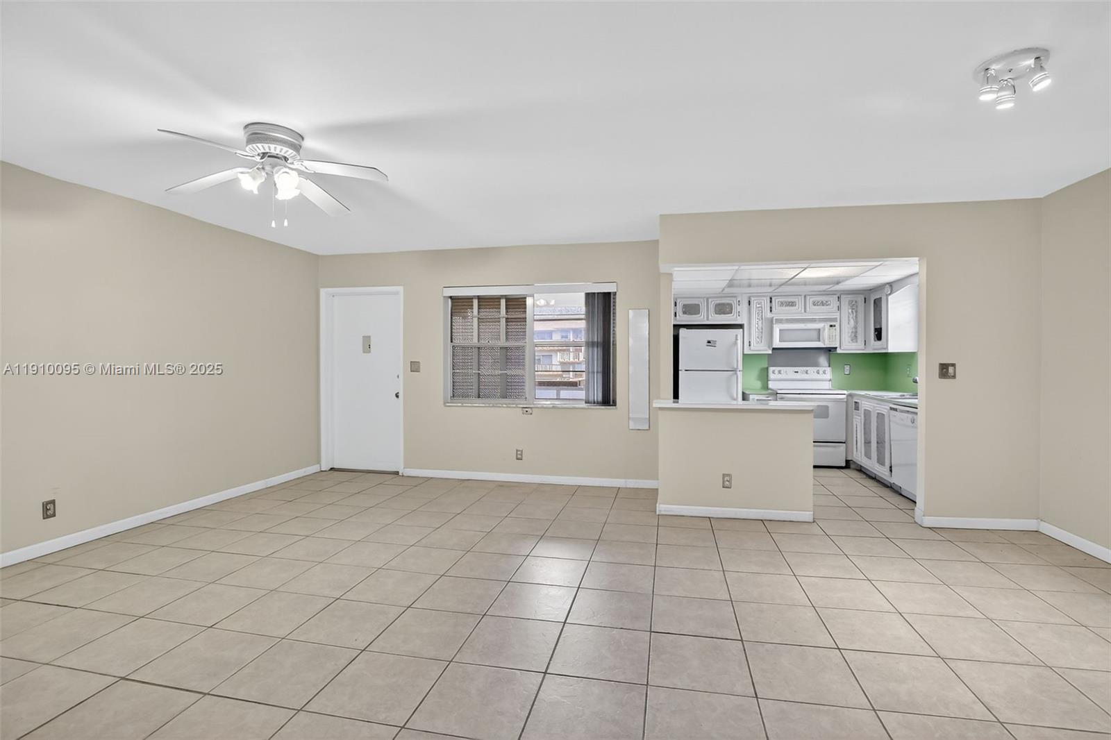 5300 Washington Street, Unit T218 Hollywood, FL 33021 - Photo 7 of 36 a view of kitchen and window