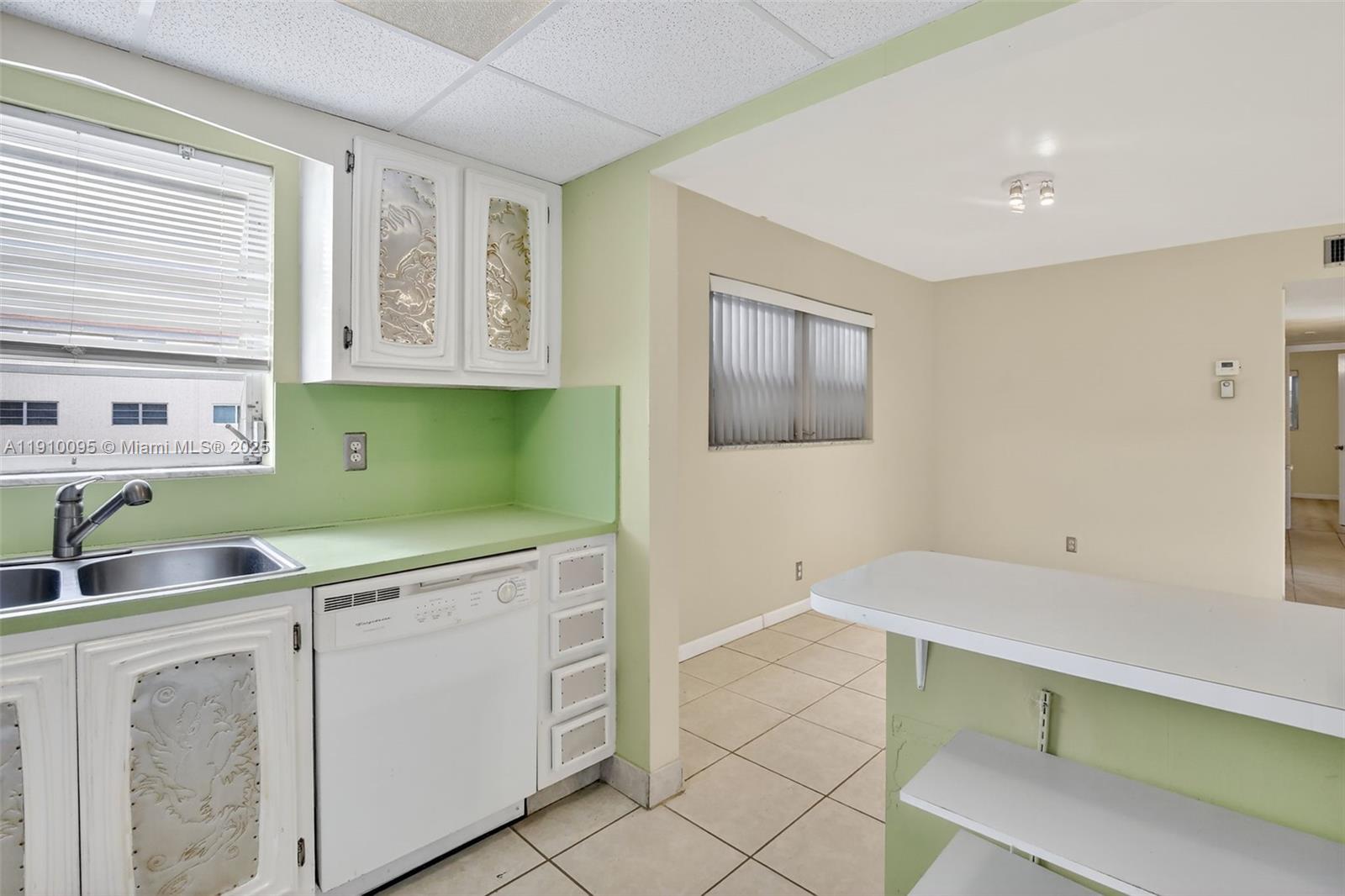 5300 Washington Street, Unit T218 Hollywood, FL 33021 - Photo 10 of 36 a room with a sink cabinets and utility room