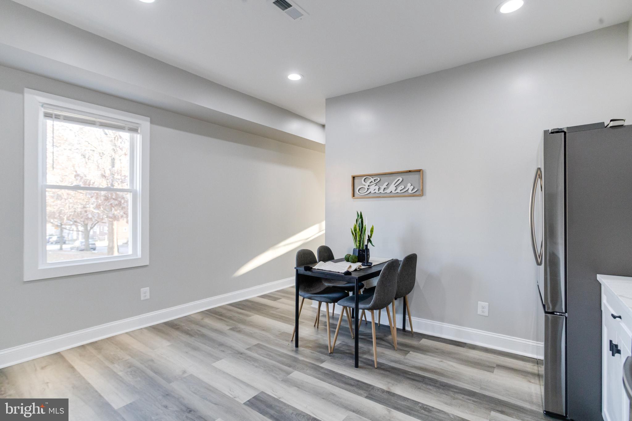 1534 Homestead Street Baltimore, MD 21218 - Photo 13 of 48 a workspace with furniture and window