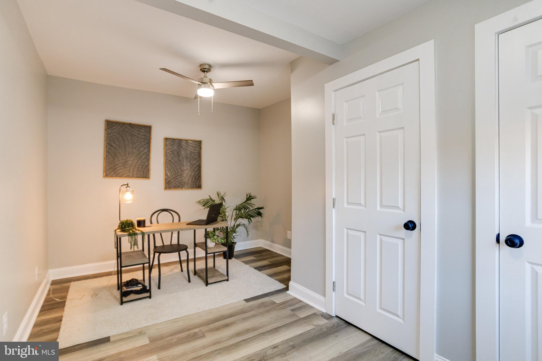 1534 Homestead Street Baltimore, MD 21218 - Photo 16 of 48 a view of a livingroom with furniture and staircase