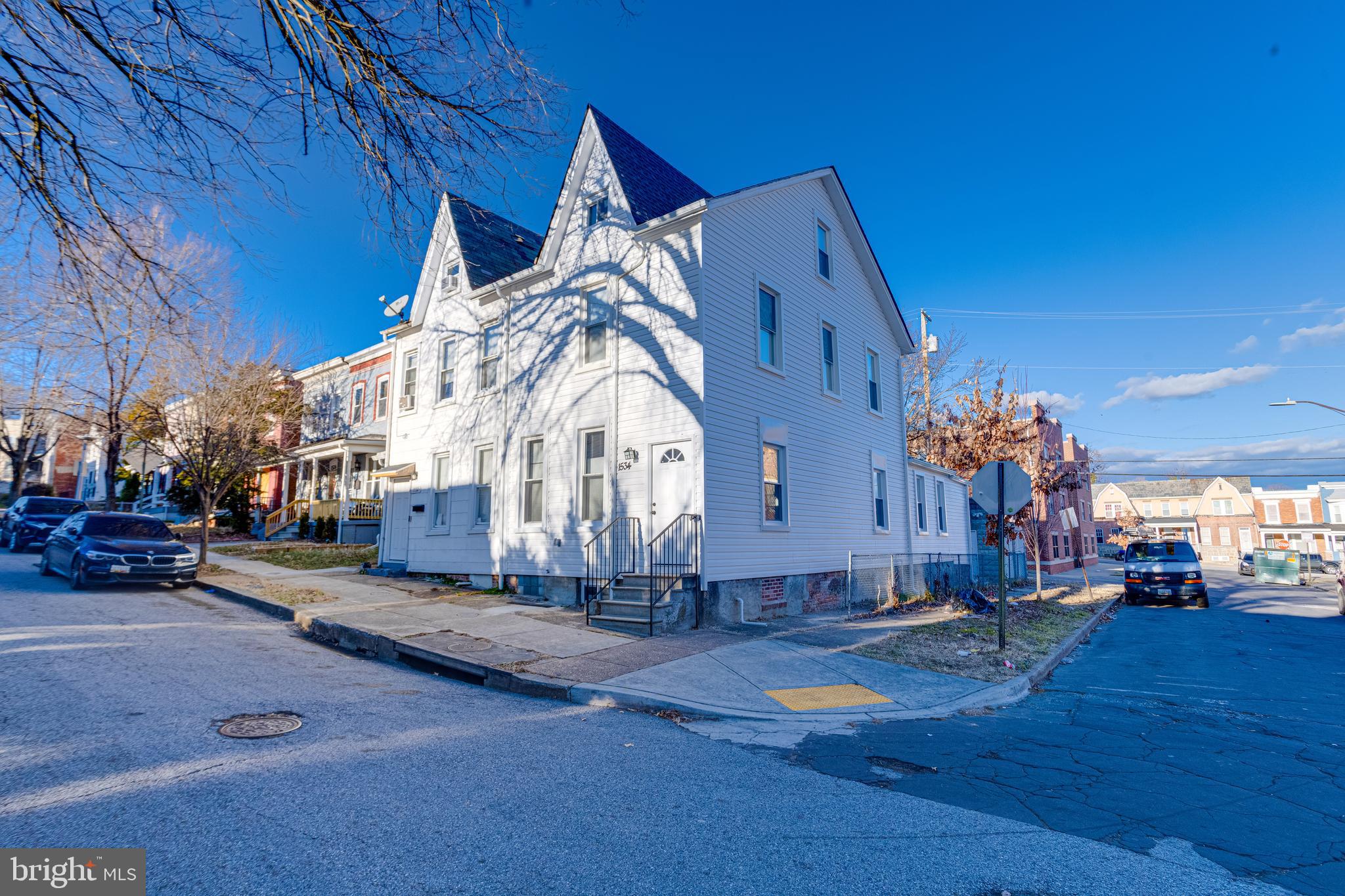 1534 Homestead Street Baltimore, MD 21218 - Photo 2 of 48 a view of a building with car parked
