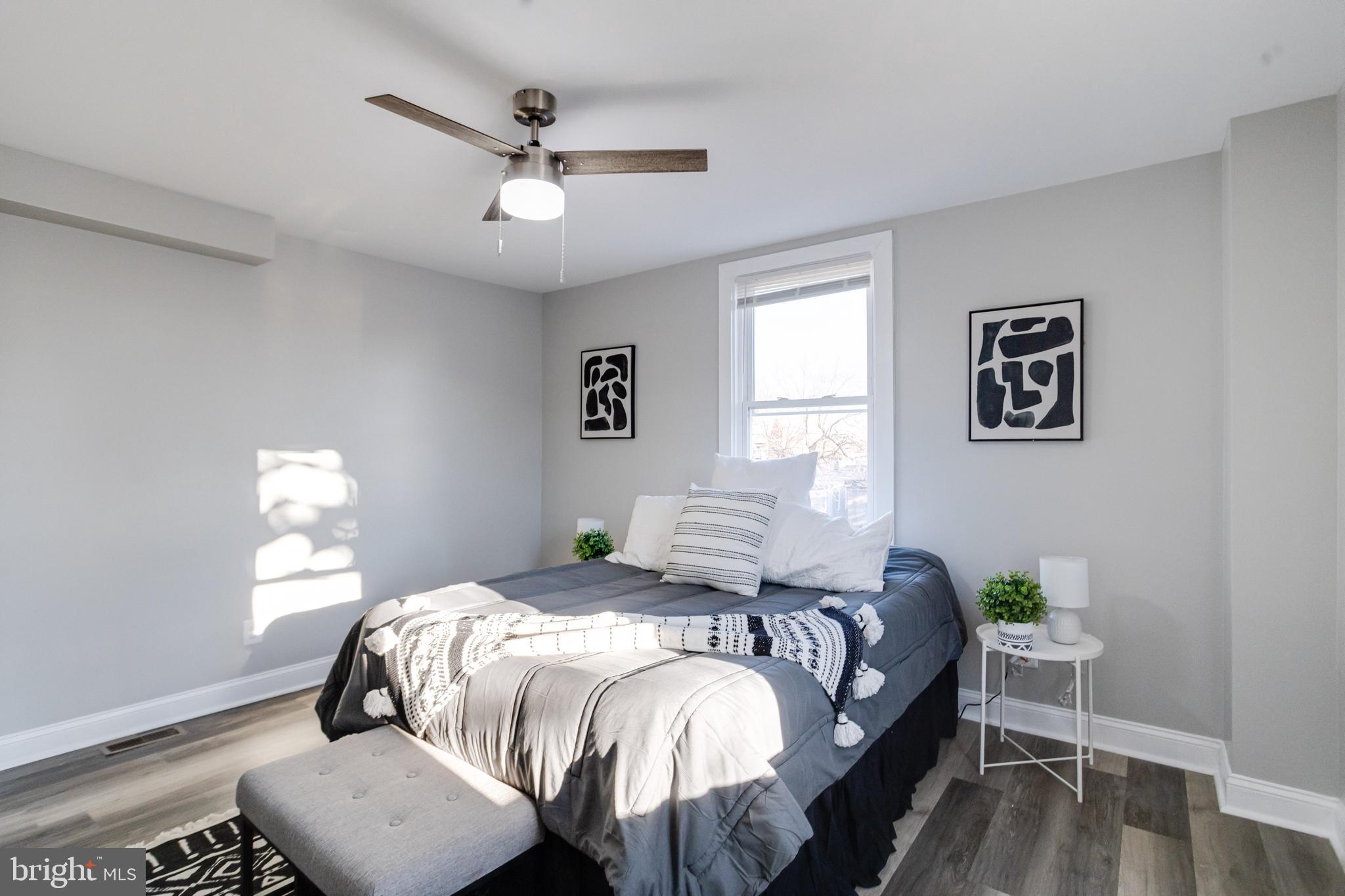 1534 Homestead Street Baltimore, MD 21218 - Photo 26 of 48 a bedroom with bed and a window