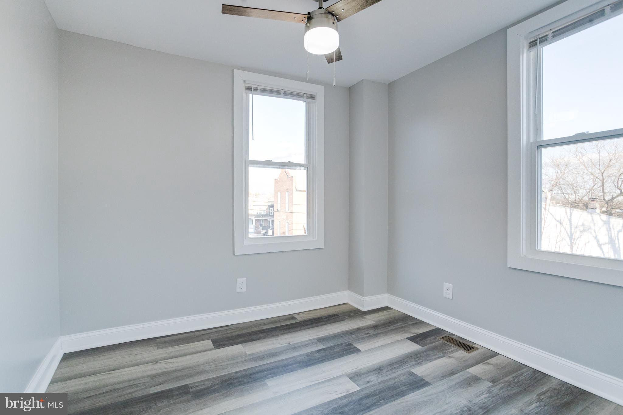 1534 Homestead Street Baltimore, MD 21218 - Photo 32 of 48 an empty room with a window