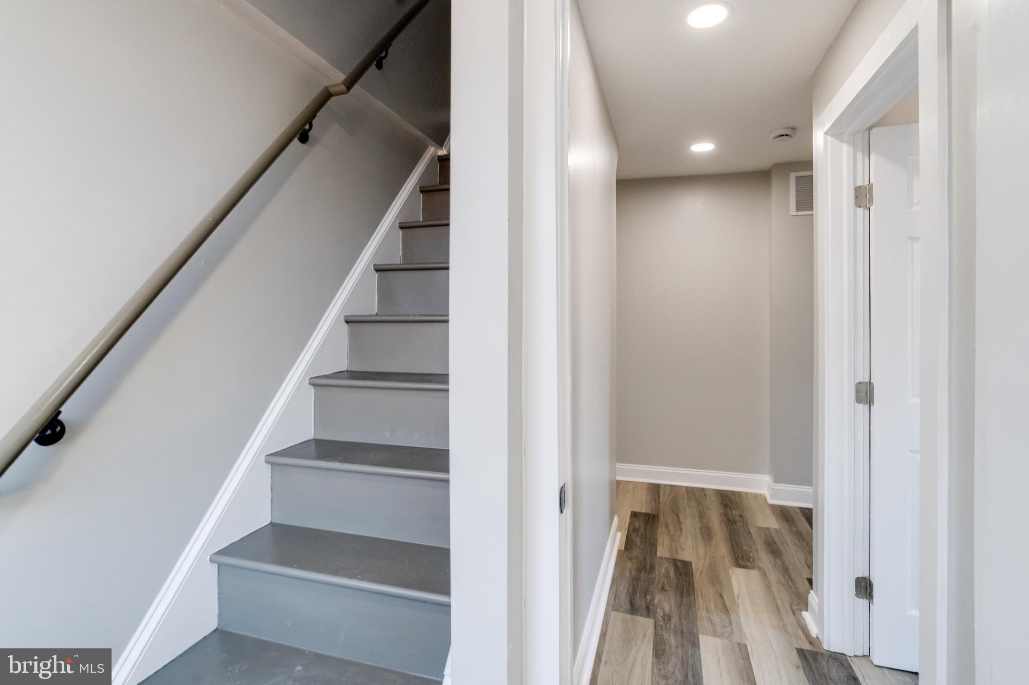 1534 Homestead Street Baltimore, MD 21218 - Photo 36 of 48 a view of entryway with wooden floor