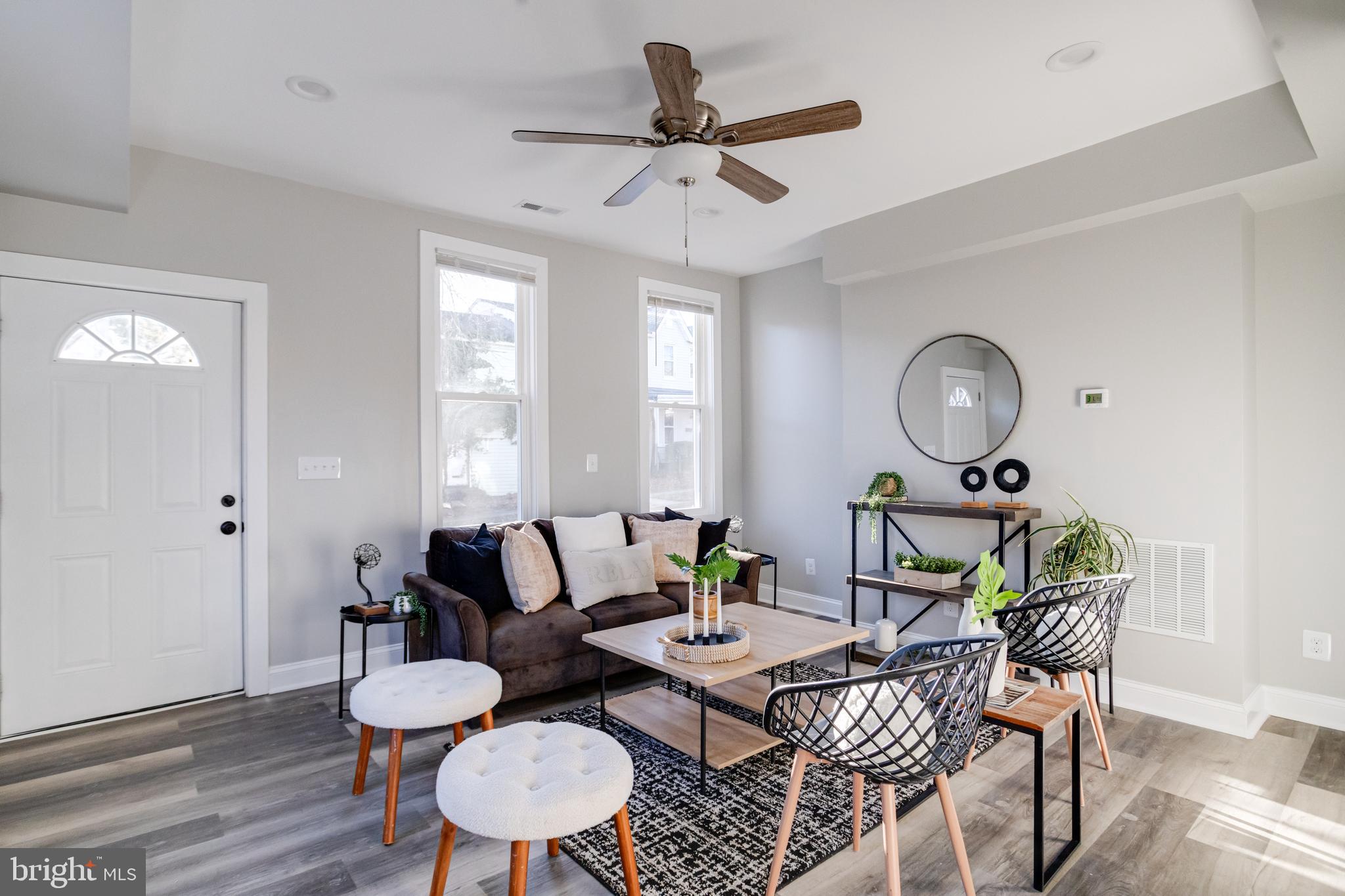 1534 Homestead Street Baltimore, MD 21218 - Photo 5 of 48 a living room with furniture and wooden floor