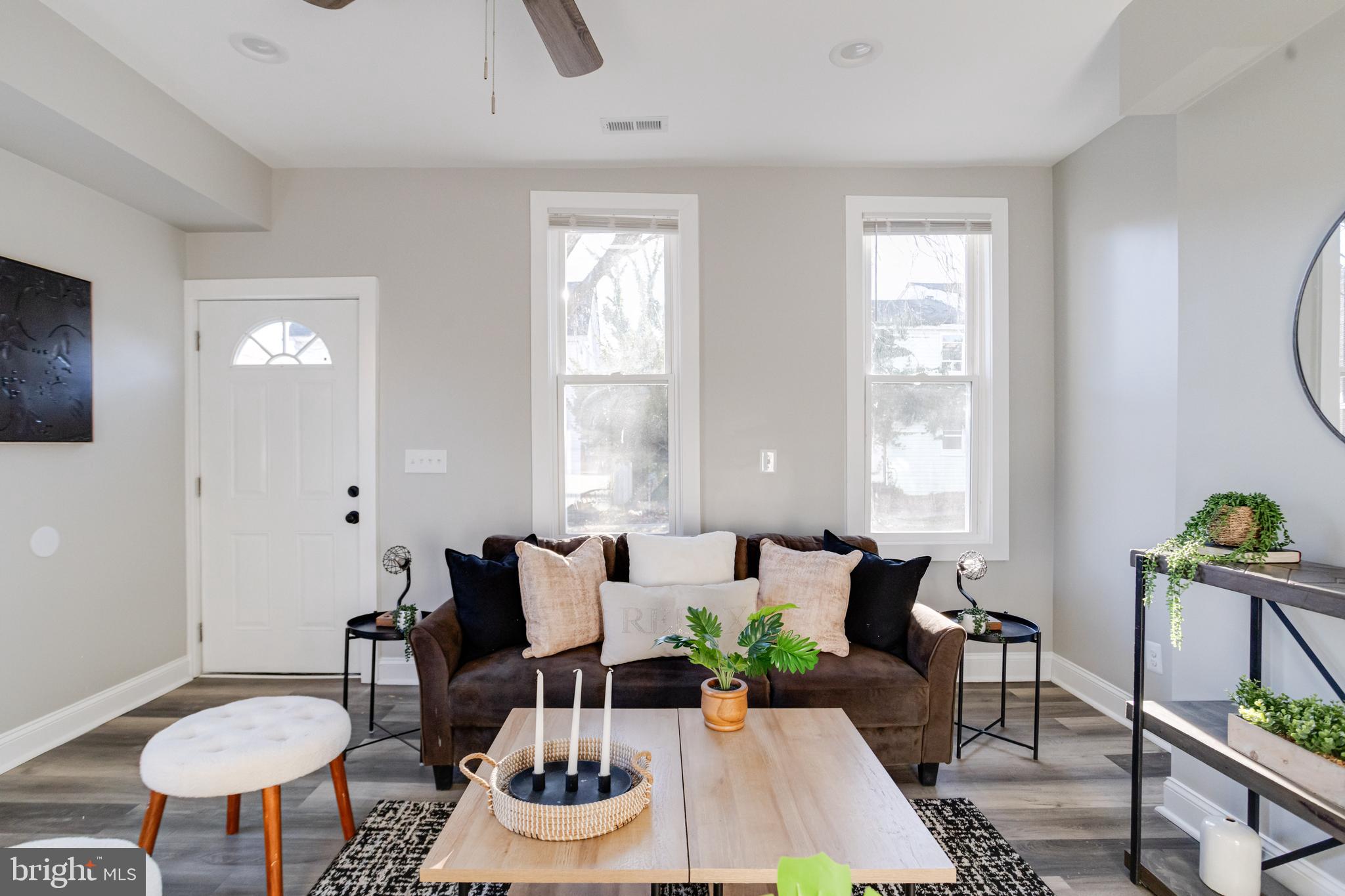 1534 Homestead Street Baltimore, MD 21218 - Photo 6 of 48 a living room with furniture and wooden floor