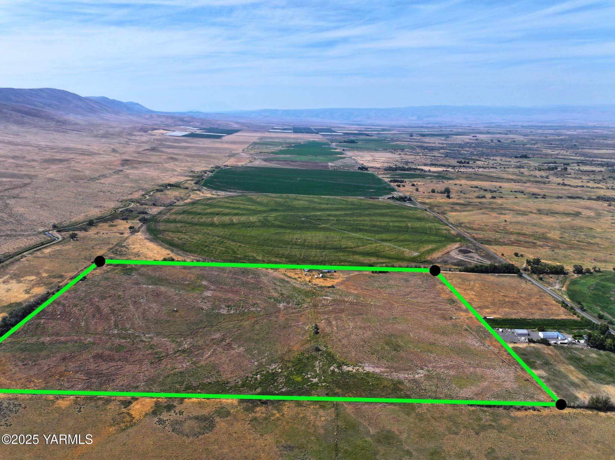 a view of an outdoor space with mountain view