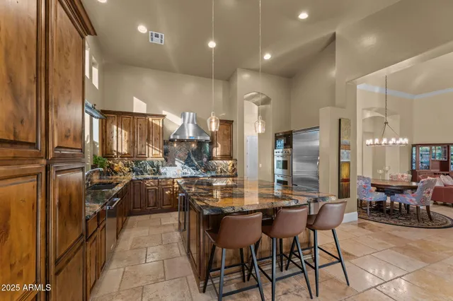 a kitchen with lots of counter top space and appliances