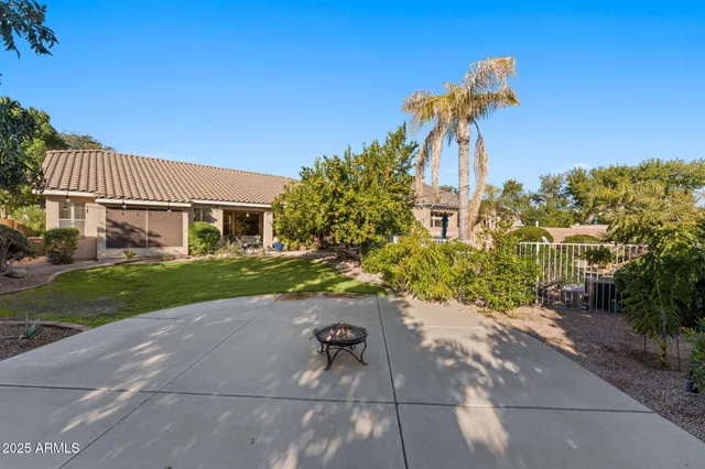 a backyard of a house with lots of green space