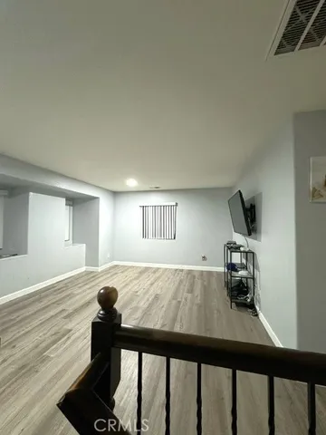 a view of a living room and dining room