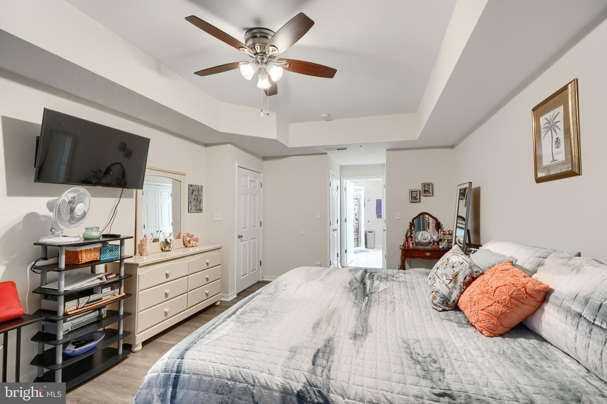 231 Roundhouse Drive, Unit 3E Perryville, MD 21903 - Photo 14 of 38 a bedroom with a bed and a flat screen tv