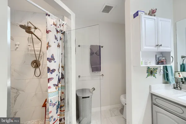 a bathroom with a shower curtain