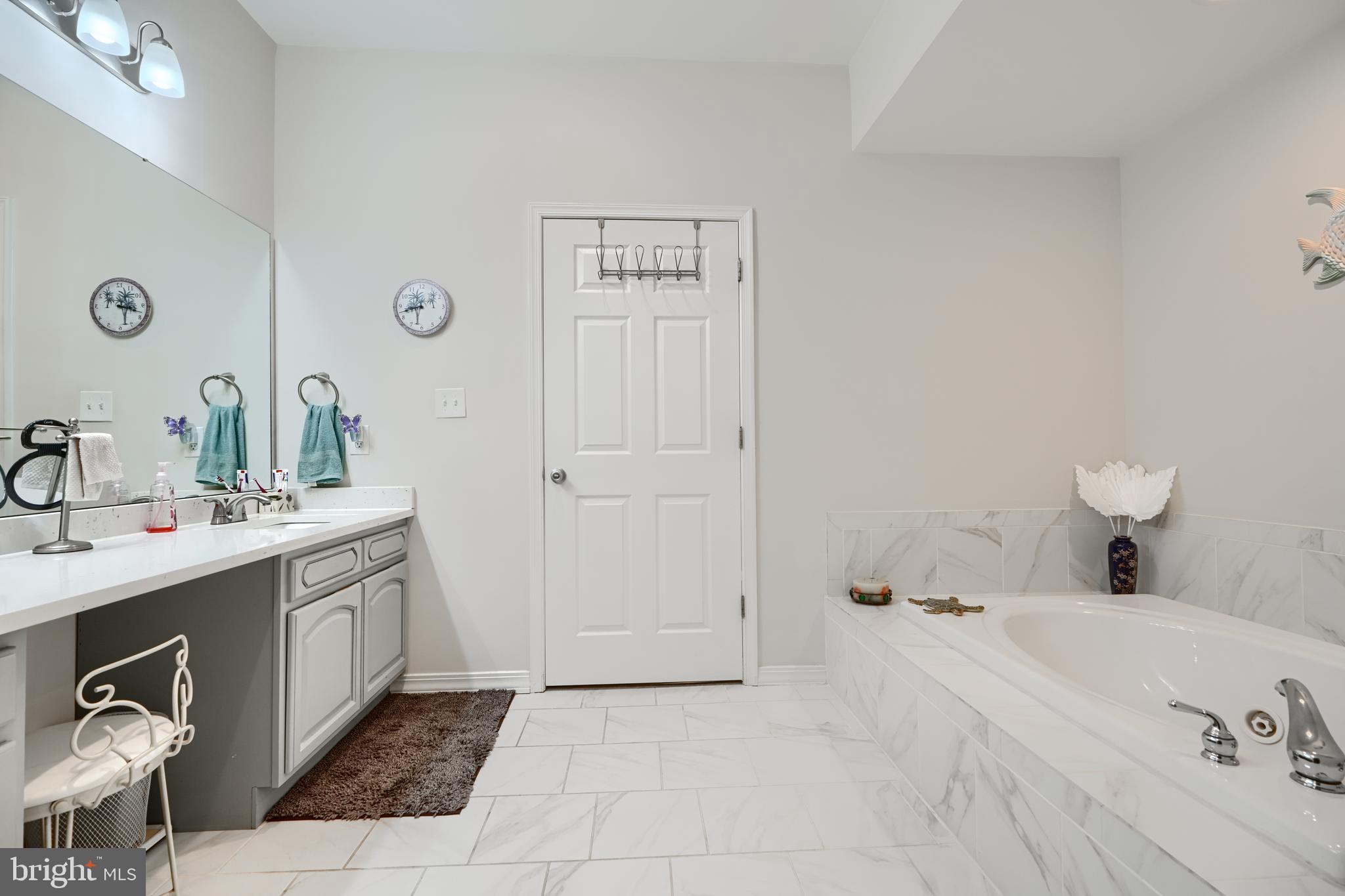 231 Roundhouse Drive, Unit 3E Perryville, MD 21903 - Photo 25 of 38 a bathroom with a sink and a mirror