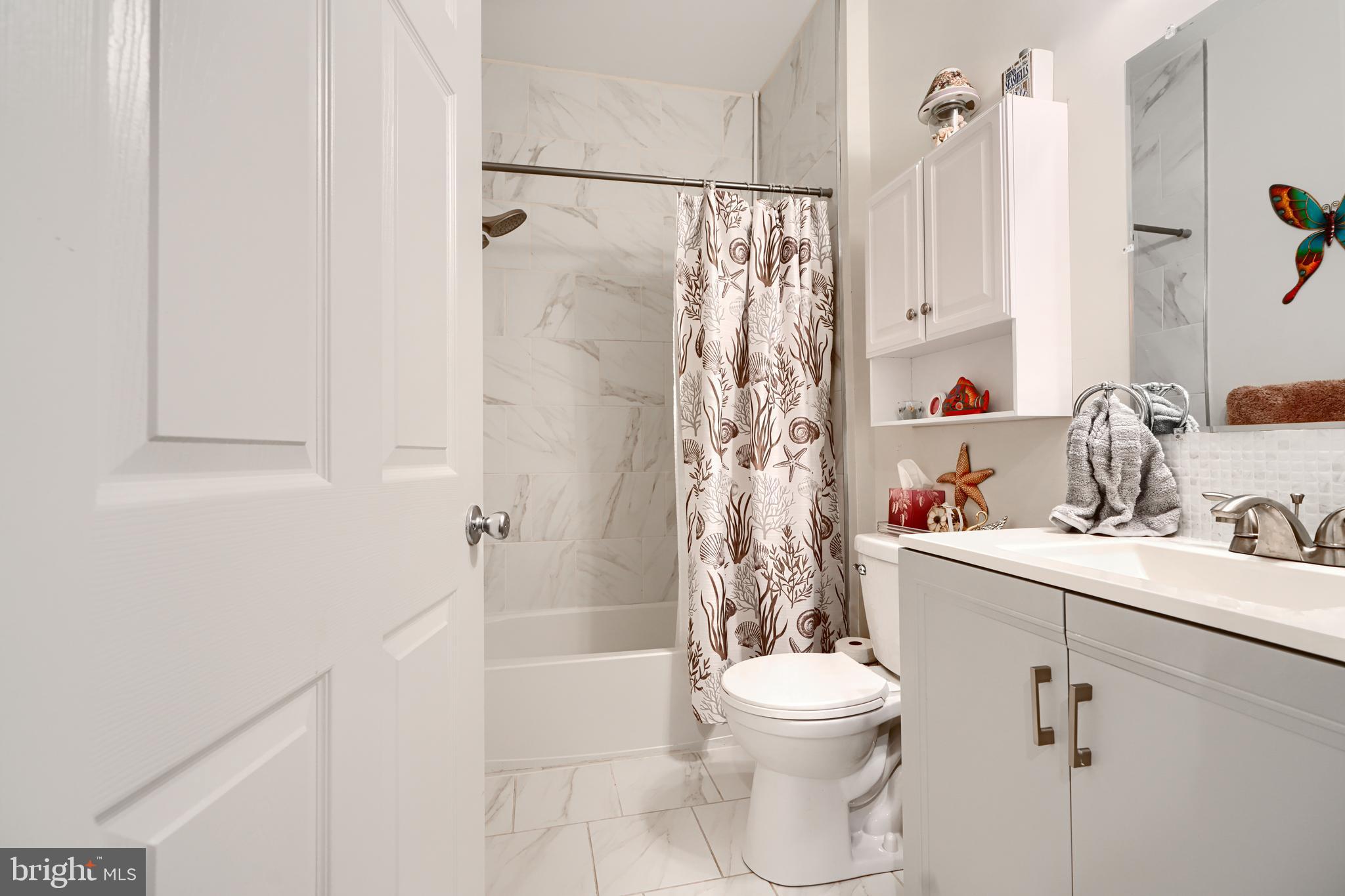 231 Roundhouse Drive, Unit 3E Perryville, MD 21903 - Photo 30 of 38 a bathroom with a sink toilet and shower