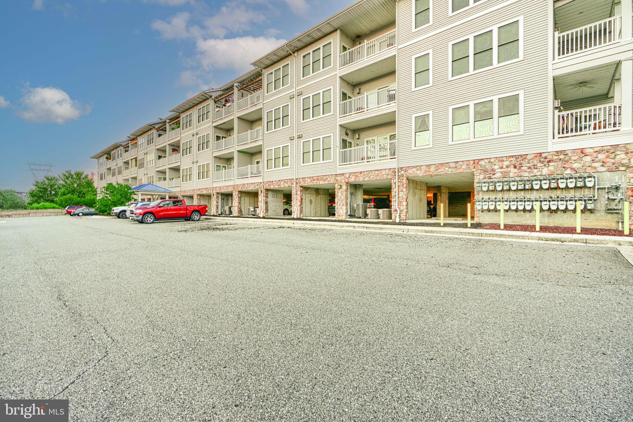 231 Roundhouse Drive, Unit 3E Perryville, MD 21903 - Photo 35 of 38 front view of building with large windows