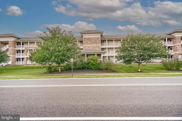 a view of building with yard
