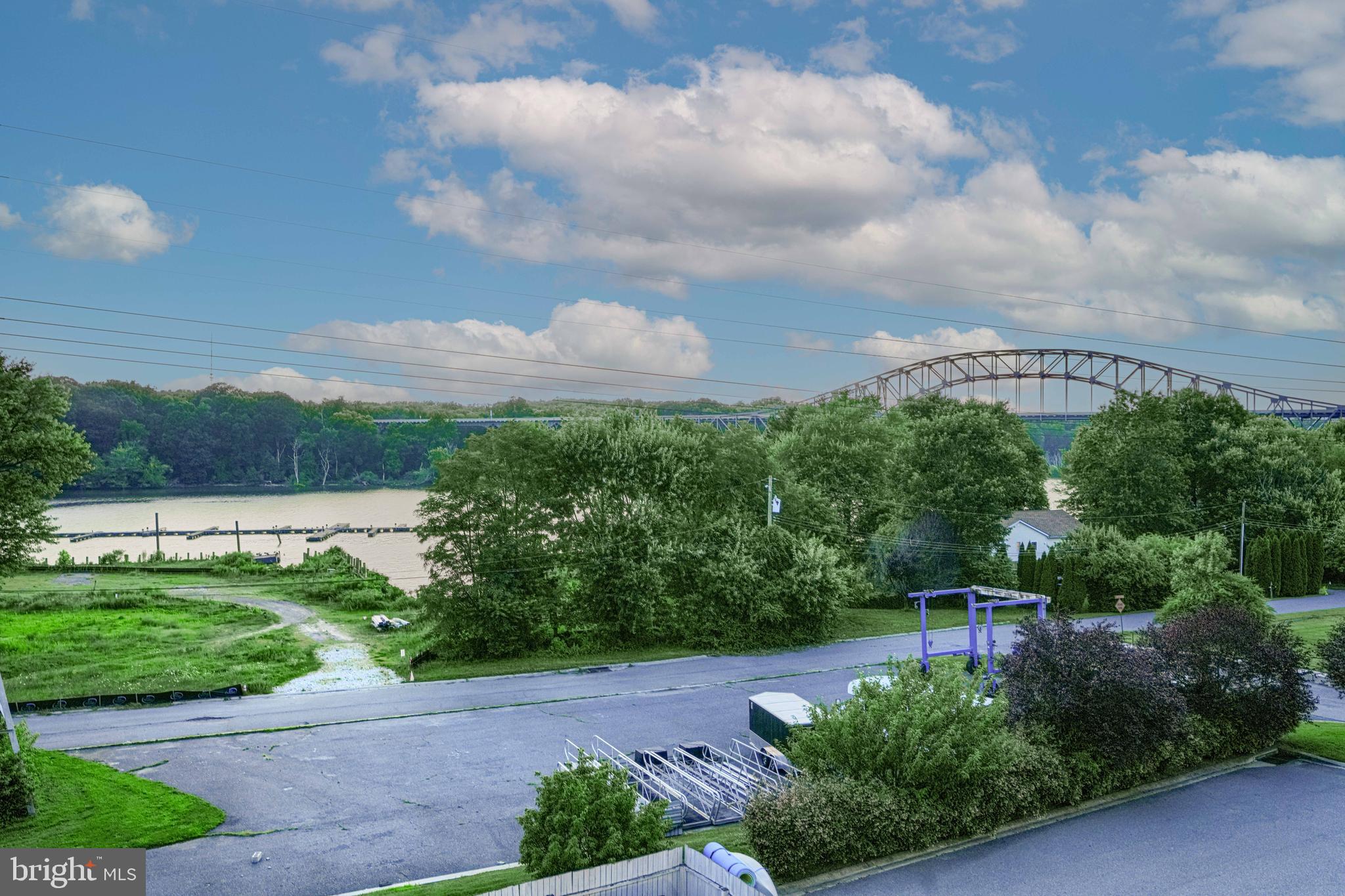 231 Roundhouse Drive, Unit 3E Perryville, MD 21903 - Photo 37 of 38 a view of a garden with a building in the background