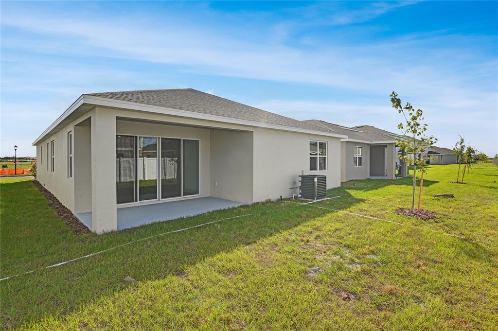5347 Mickey Avenue Lake Wales, FL 33859 - Photo 18 of 18 a view of a house with backyard