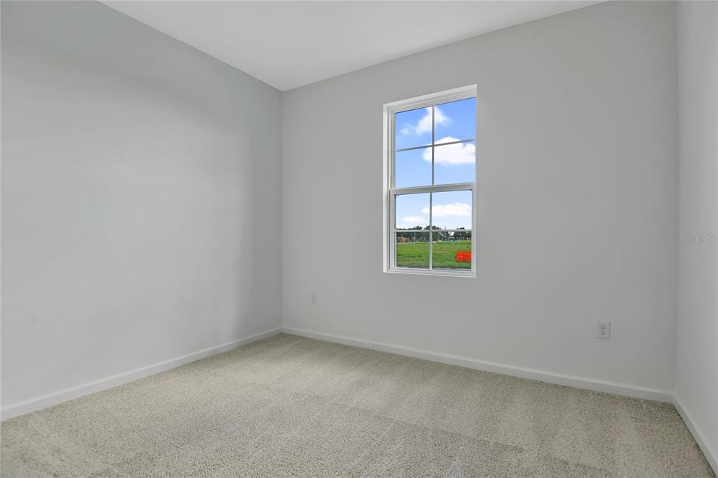 5347 Mickey Avenue Lake Wales, FL 33859 - Photo 3 of 18 an empty room with windows