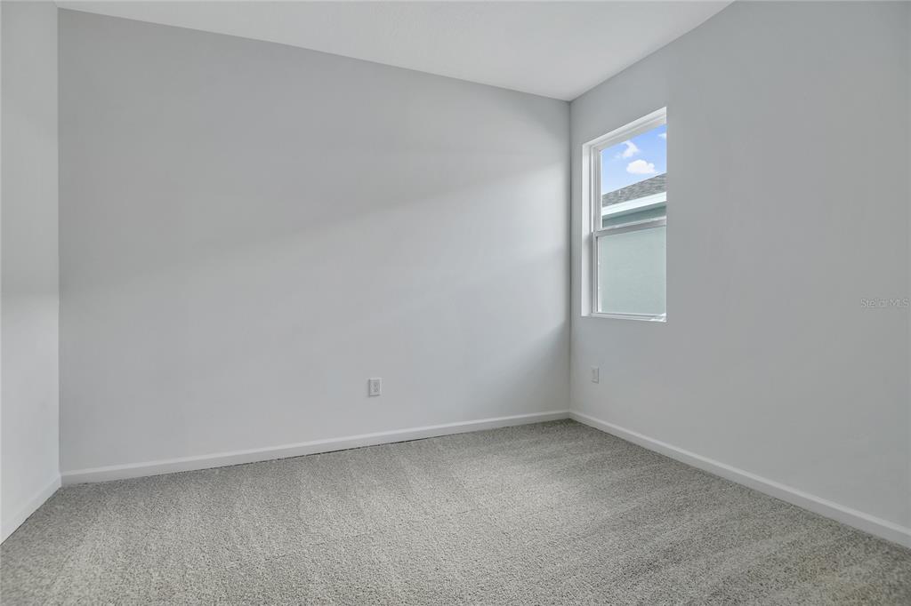 5347 Mickey Avenue Lake Wales, FL 33859 - Photo 5 of 18 an empty room with a bench