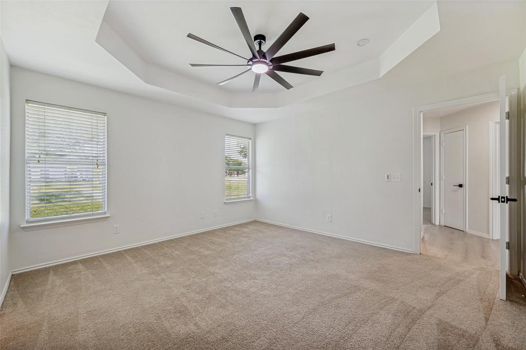 629 Concho Drive Oak Point, TX 75068 - Photo 17 of 35 a view of an empty room with a window