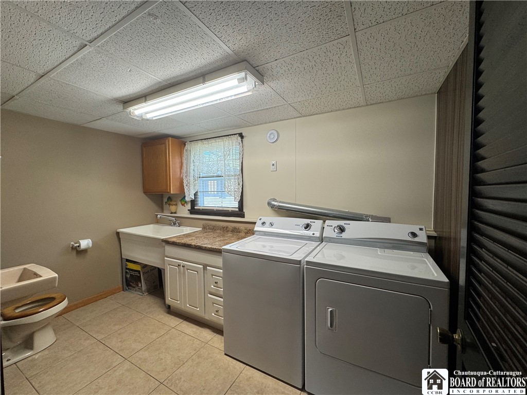 1522 4 Mile Road Allegany, NY 14706 - Photo 31 of 49 Half bath and laundry room- washer and Dryer inclu